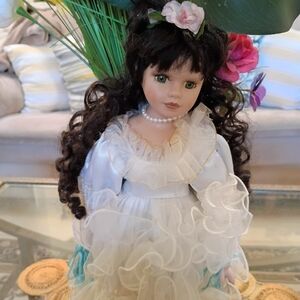 Elegant White Porcelain Doll with Black Hair